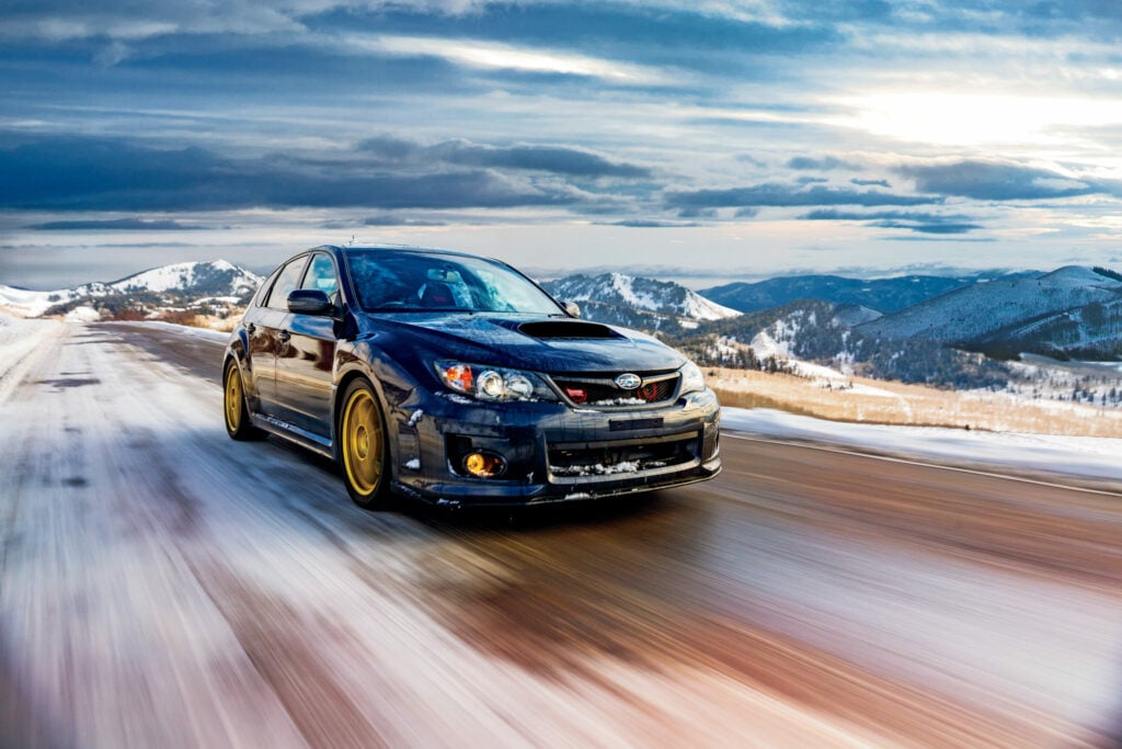 car driving on a mountain road