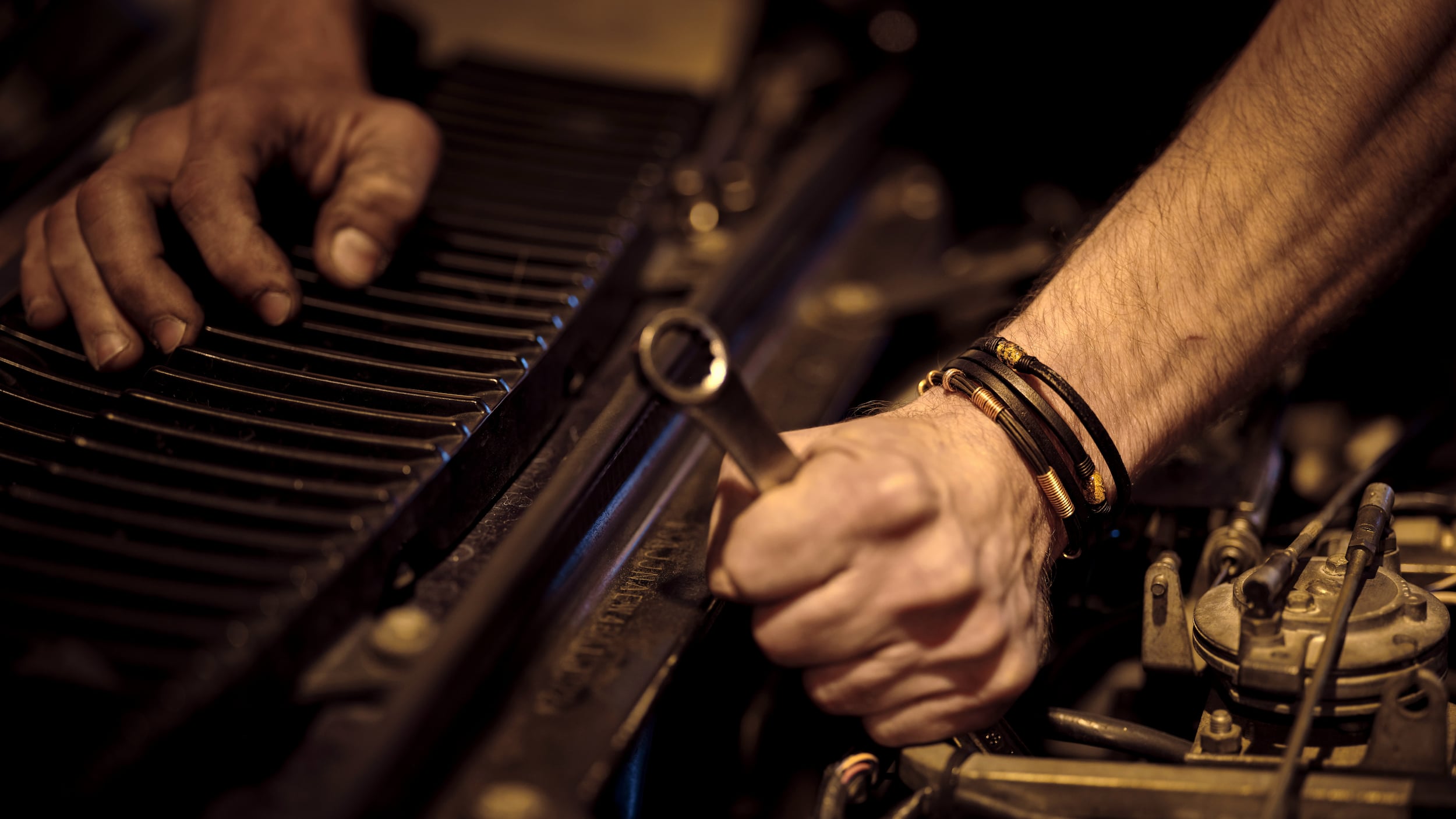 Advantage Man With Spanner Car Engine For Oil Change (1)